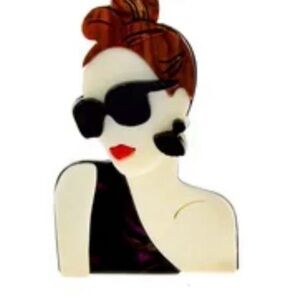 One shoulder dress brooch.